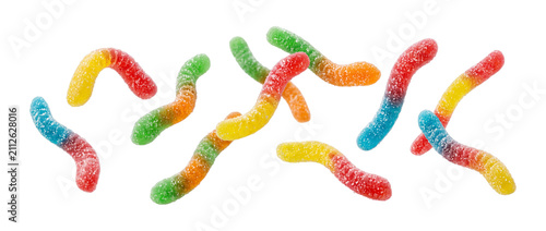 Falling colorful gummy worm candies with sugar coating isolated on transparent background