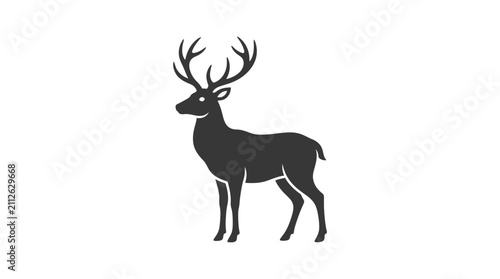 Foto Black silhouette of a standing male deer with antlers.