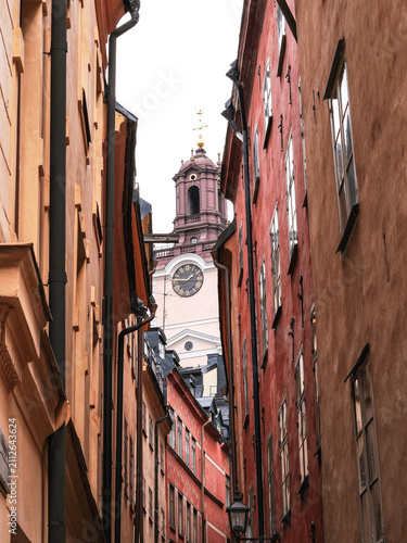 Old buildings in the old town of Stockholm, Sweden with the church in the background.