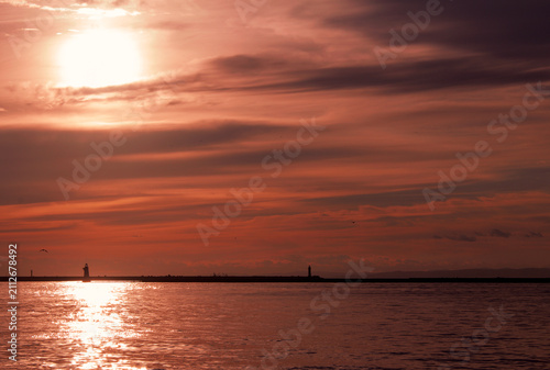 Beautiful Autumn Evening Sky and Ocean View with Lighthouse Silhouette in Kushiro