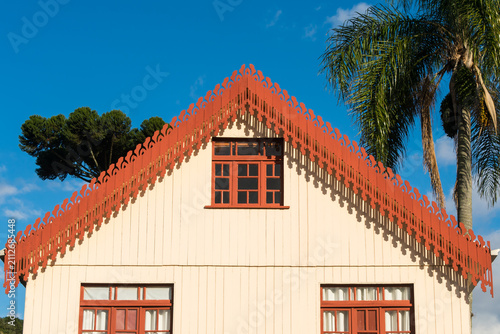 Decorative wooden trim (lambrequim) on a historic colonial house in Antônio Prado, Rio Grande do Sul, Brazil