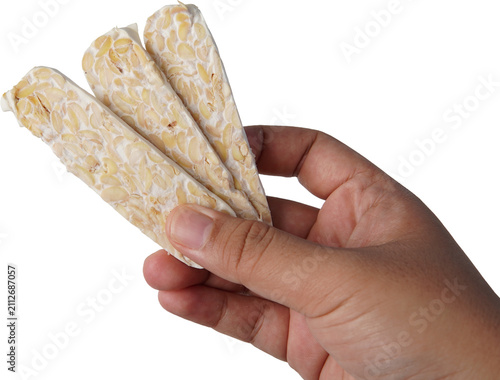 фотографія fresh raw tempeh slices isolated on white background
