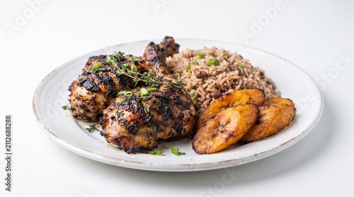 Traditional Jamaican jerk chicken served with seasoned rice and peas alongside golden fried plantains. Authentic Caribbean cuisine. Isolated on White Background.
