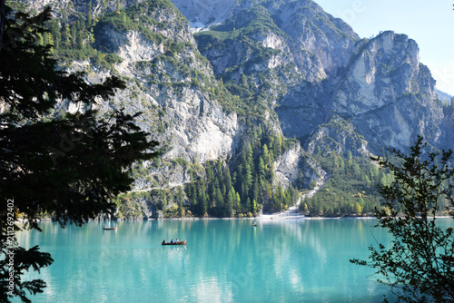 Bild auf Leinwand Beautiful lake and canoes on Lake Braies, Pragser Wildsee, Italy.