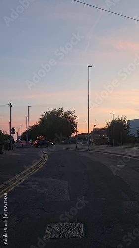 Low Angle Illuminated Streets View of Luton City of England United Kingdom During Orange Sunset Evening. Wide Angle Camera Footage Was Captured During Walk at Night of July 23rd, 2026.