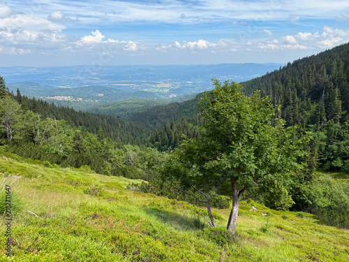 Panoramic View from Śnieżka Mountain over the Karkonosze Mountains and Karpacz Town, Poland under Dramatic Summer Clouds