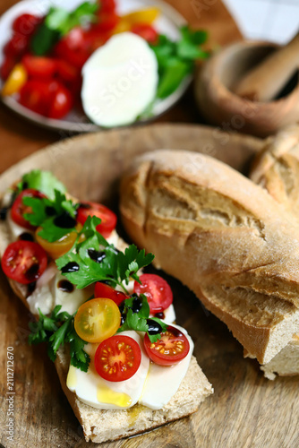 Caprese sandwich with mozzarella and cherry tomatoes