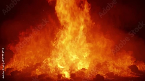 Large Campfire Flames Burning Brightly At Night With Glowing Ember Background For Outdoor Scene video clip