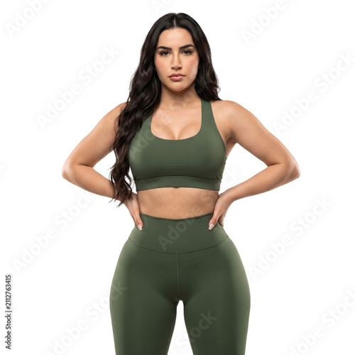 Confident young woman in stylish olive green athletic sportswear, a sports bra and high-waisted leggings, modeling active fashion, Isolated on a Transparent Background PNG