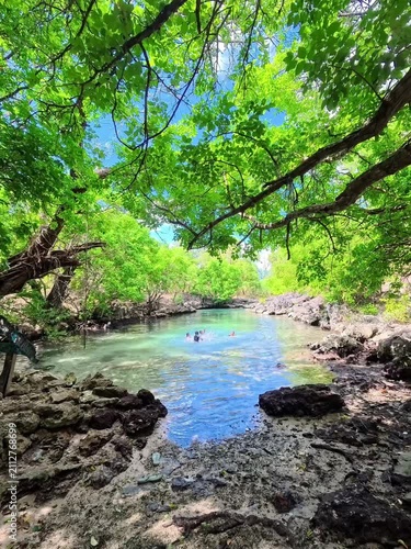 Children Playing in Natural Pool