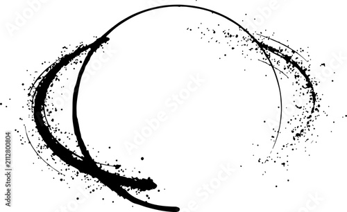 Abstract black ink brush stroke circle frame with paint splatter effect