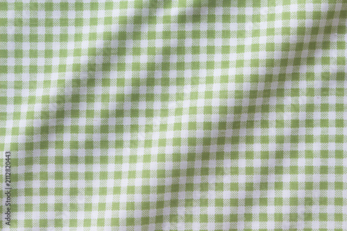 Crumpled green gingham fabric