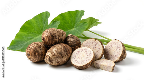 Fresh raw taro root or dasheen with green leaves isolated on white background, healthy organic vegetable