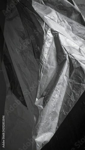 Abstract black and white texture of crumpled paper.