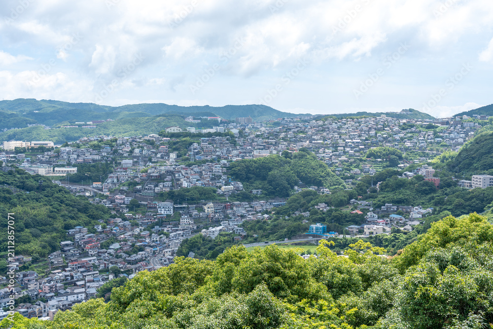 Fototapeta premium Wide Landscape of Nagasaki Sloped Residential Hills and Mountains