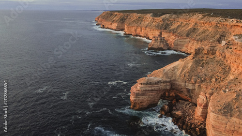 Fotografía Wide angle aerial view of Island Rock and Natural Bridge coastal cliffs near Kalbarri, Western Australia
