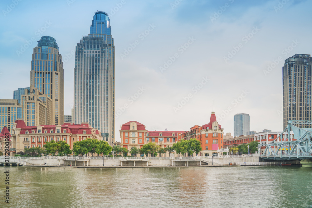 Obraz premium The modern urban architecture skyline and Haihe River scenery in Tianjin, China were captured on April 11, 2025