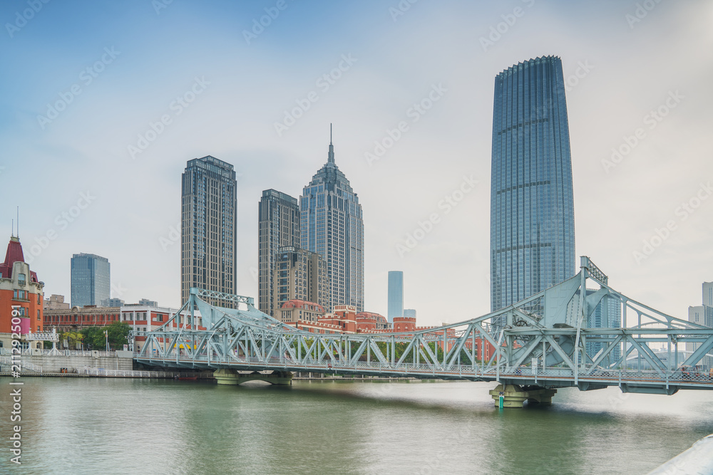 Obraz premium The modern urban architecture skyline and Haihe River scenery in Tianjin, China were captured on April 11, 2025