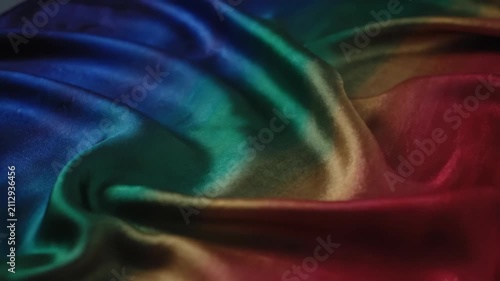Colorful silk fabric close up, colorful silk flowing texture