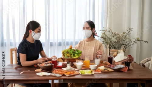 Two friends wearing face masks while dining at a restaurant