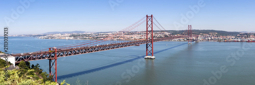 Ponte 25 de Abril suspension bridge over Tagus River panorama in Lisbon, Portugal