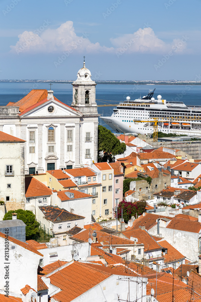 Fototapeta premium Lisbon skyline view of Alfama district with cruise ship in Lisbon, Portugal