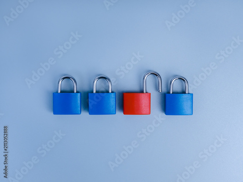 Принти на полотні Blue locked and red unlocked padlocks representing cybersecurity, data security, access control, authentication, identity protection, vulnerability, security breach, risk management and digital trust