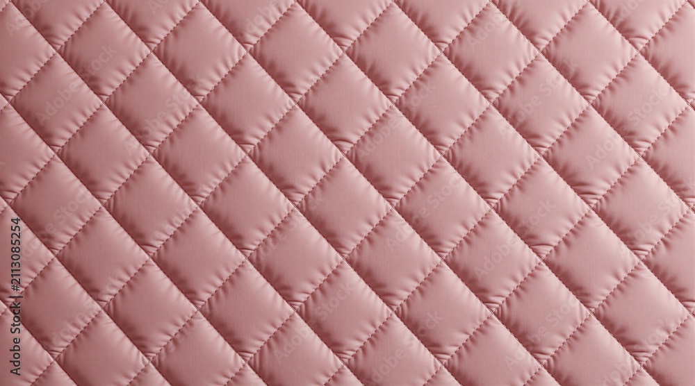 Obraz premium Soft pink quilted fabric background with geometric diamond pattern. Textile surface displays elegant stitched squares texture for luxury design projects. Stylish wallpaper material creates modern