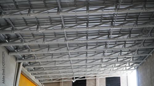 Steel truss roof structure of an under-construction building.