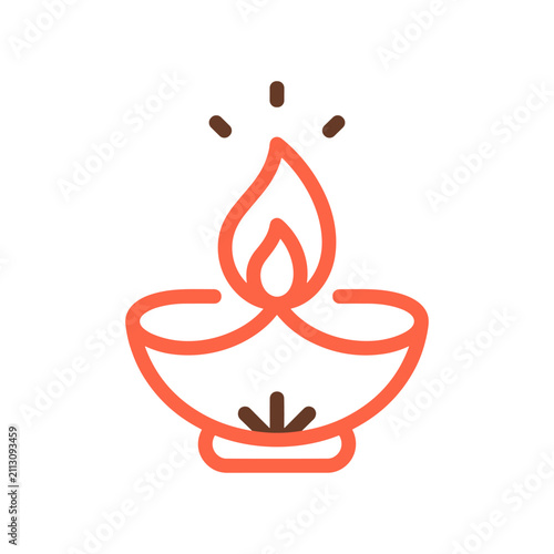 Diwali diya oil lamp burning with warm glow on white background concept for festival celebration