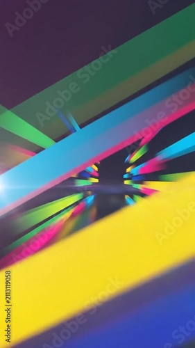 Abstract dynamic colorful light beams cutting through darkness