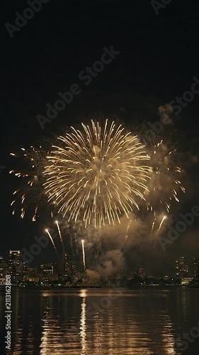 Bright golden fireworks display forming the number 2027 in the night sky
