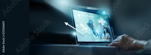 Healthcare business graph and data of Medical business growth .Businessman analyzing data and growth chart on laptop, investment, financial and banking, Medical service to solve people health.