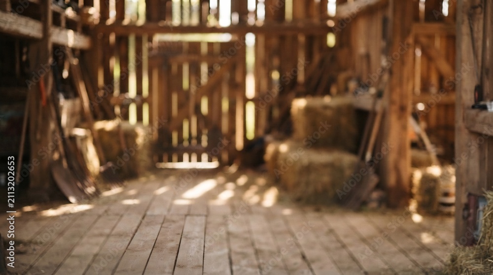 Fototapeta premium 木造小屋の室内 干し草 bales が積まれ 太陽光が差し込む