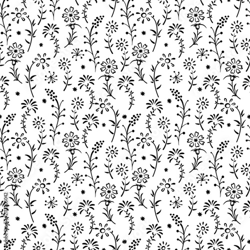 seamless botanical pattern of hand-drawn flowers and leaves 