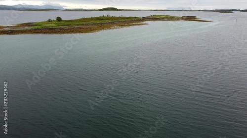 Calm waters and islands in Norway at early morning