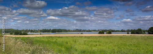 Meadows and fields by Lake Jeziorak, near the village of Matyty, Iława Lake District, Poland