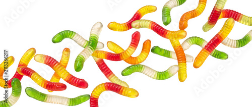 Принти на полотні Colorful gummy worms scattered isolated on transparent background