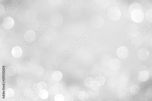Foto Light reflections create bright spots on a white background