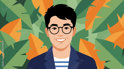 A friendly young man wearing glasses standing in front of a tropical leaf background.