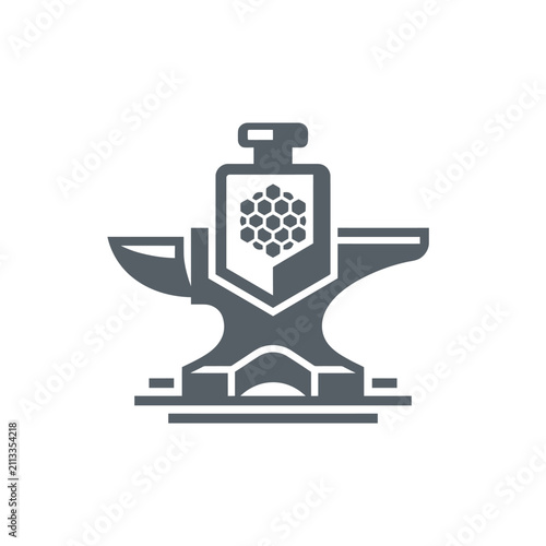 Industrial anvil with honeycomb shield emblem.