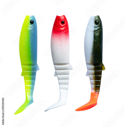 Quadro su tela Fishing lure soft bait set, set of three colorful silicon swimbaits in lime, red, and dark patterns for predator angling, spinning tackle assortment