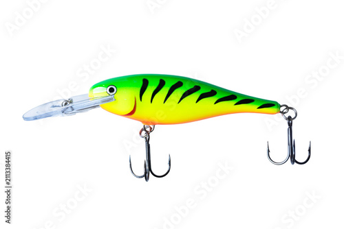 Obraz na plátne Fishing lure hard plastic crankbait, neon lime green perch pattern wobbler with sharp treble hooks, hard bait for predator angling