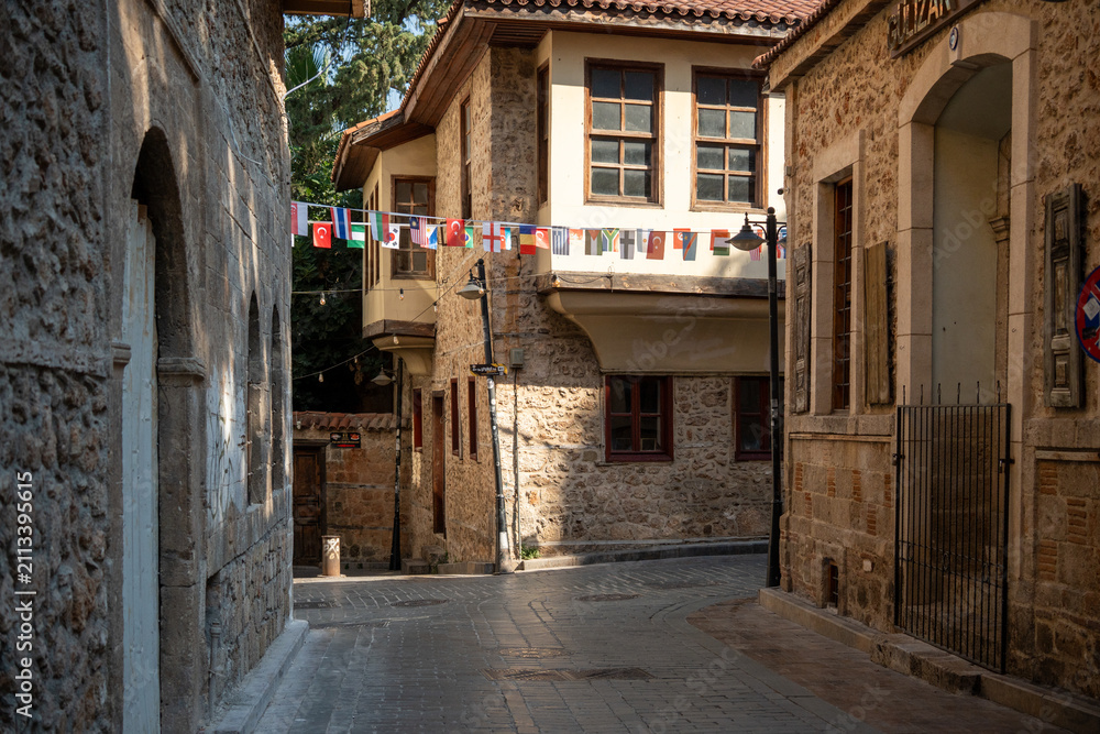 Fototapeta premium Narrow stone street of Kaleici old town in Antalya Turkey