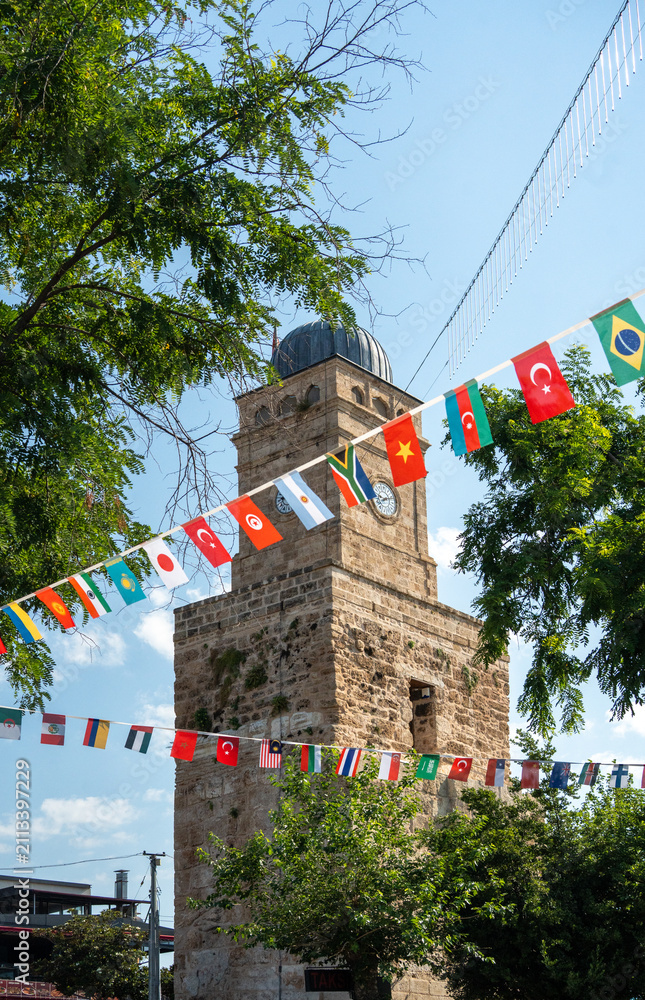 Fototapeta premium Historic Antalya Clock Tower Saat Kulesi in Kaleici old town Turkey