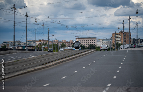 Photography Wide angle look at traffic and tramway on Bolshoy Ustinsky Bridge in Moscow