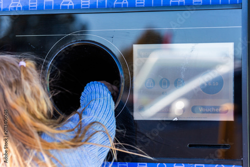 return and earn collection point screen with money to redeem from returned recycling