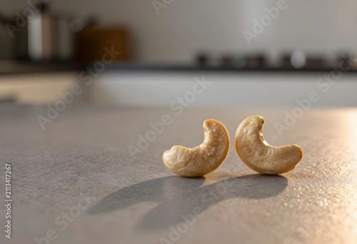 Two cashew nuts on kitchen ...