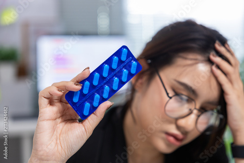 Canvastavla Medicine pill blister woman headache pain stress health treatment hand hold blue