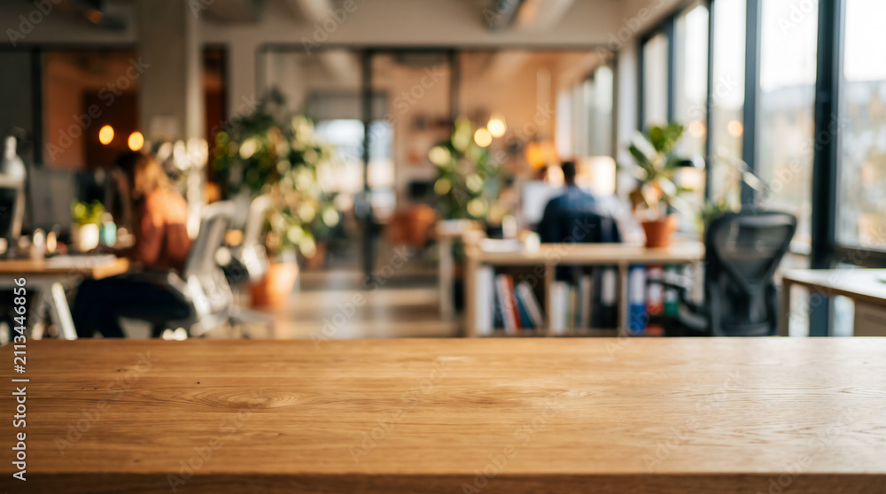 Fototapeta premium Empty wooden tabletop with blurred office interior background